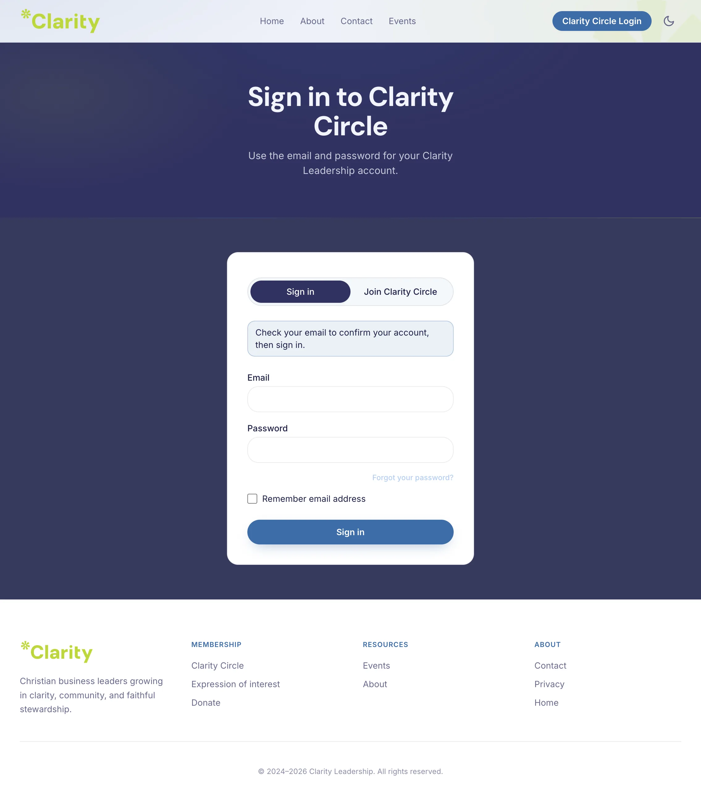 Login page showing a notice to check email and confirm the account